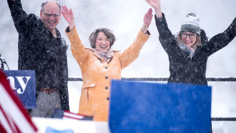 Senator Amy Klobuchar with her husband John and daughter Abigail at the announcement of her presidential bid