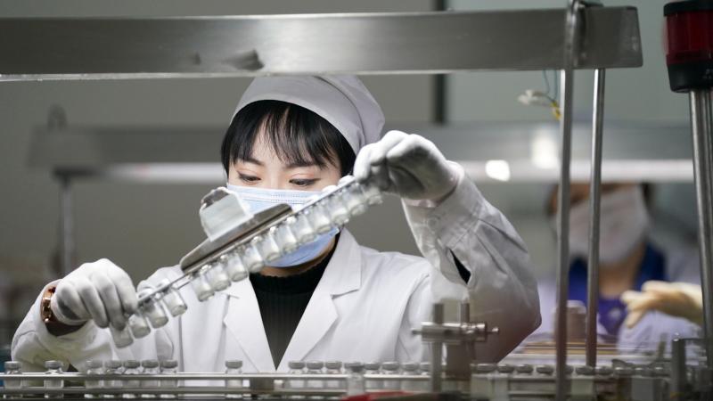 HARBIN, March 2, 2020 -- Workers are busy on the production line of Cefazolin sodium for injection in the Harbin Pharmaceutical Group General Pharmaceutical Factory in Harbin, northeast China's Heilongjiang Province, March 2, 2020. 