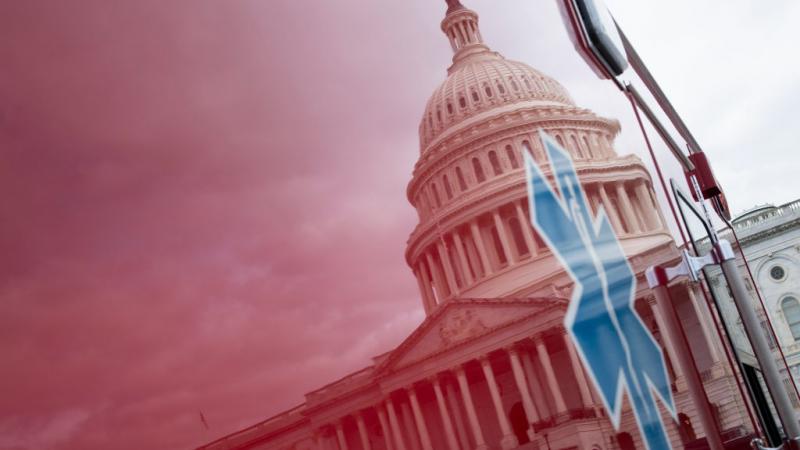 U.S. Capitol building reflected in an ambulance on March 24, 2020