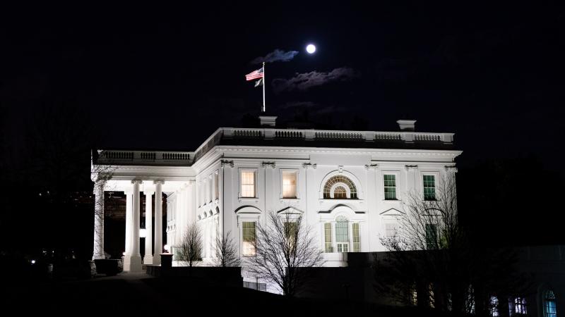 The Full Pink Supermoon, the largest full moon of 2020, is seen over the White House Tuesday, April 7, 2020, in Washington, D.C. 