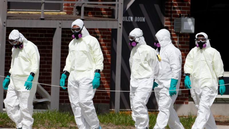 Cleaners enter the Holyoke Soldiers' Home in March