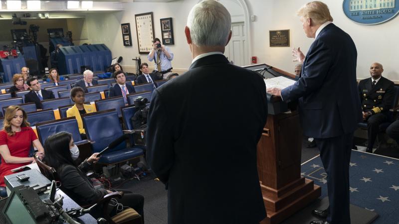 President Donald J. Trump, joined by Vice President Mike Pence and members of the White House Coronavirus Task Force, answers a reporter’s question during a coronavirus update briefing Friday, April 10, 2020