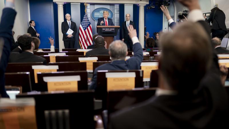 President Donald J. Trump, joined by Vice President Mike Pence and Labor Secretary Eugene Scalia, takes questions from reporters during a coronavirus update briefing Thursday, April 9, 2020, in the James S. Brady Press Briefing Room of the White House. 