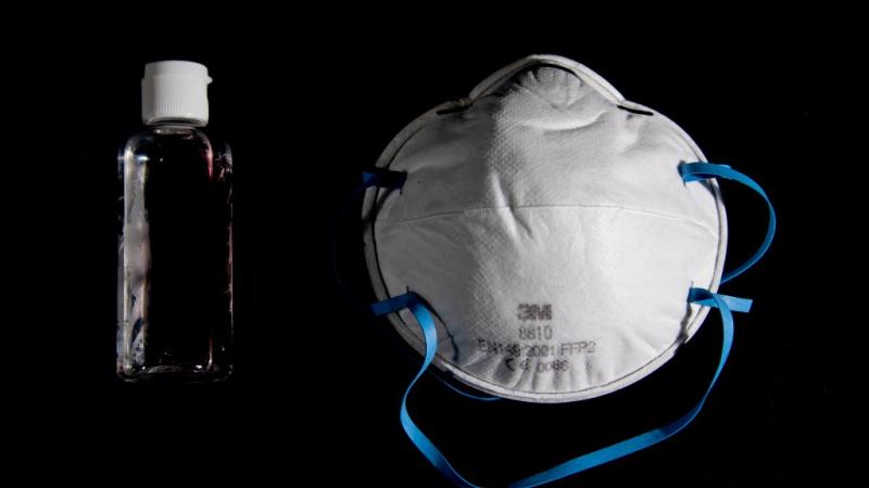 Photo of hand sanitizer and face mask in Paris on March 4, 2020