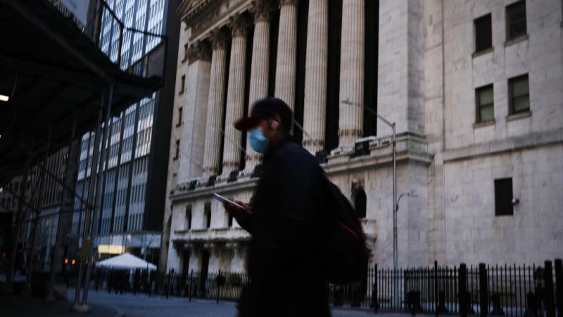 Person near the New York Stock Exchange on May 7, 2020