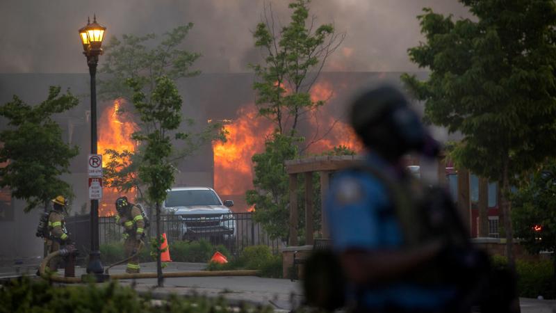 A building burns during the Minneapolis riots