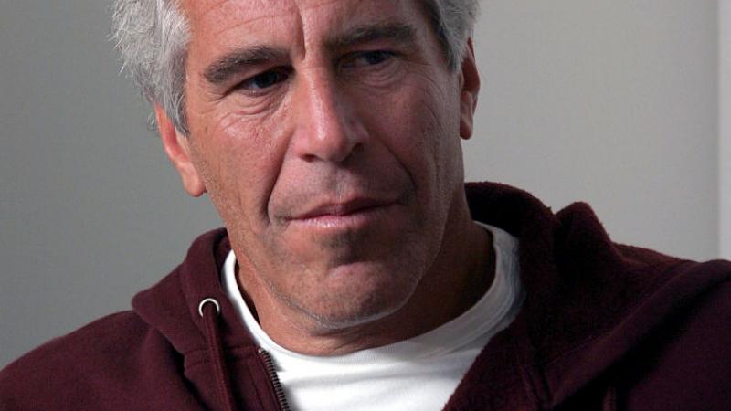 Jeffrey Epstein sporting a Harvard sweatshirt