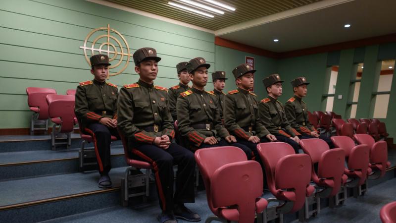Students prepare to run shooting drills at the Mangyongdae Revolutionary Schoo