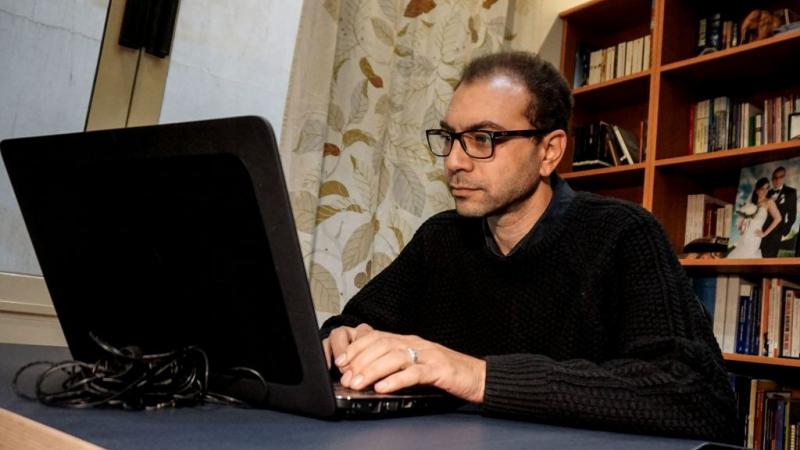 Person looking at a computer