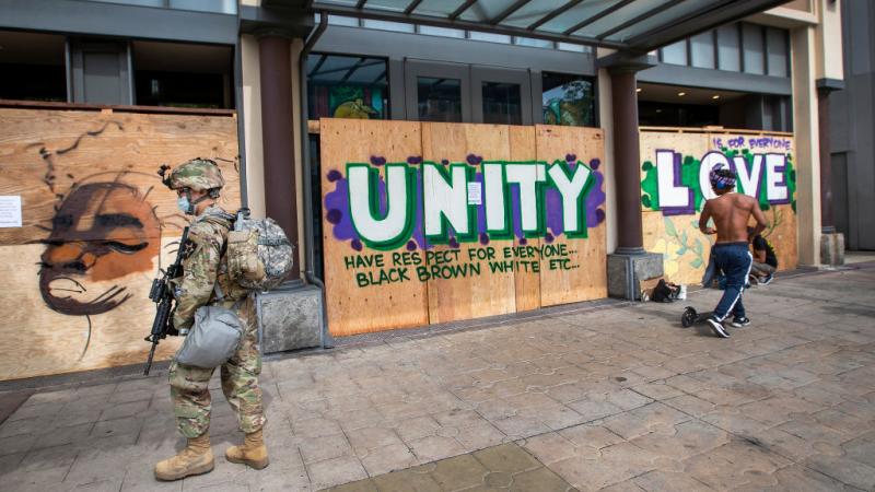 A boarded up business in Long Beach, CA