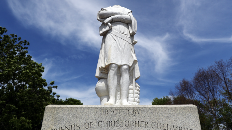 A statue of Christopher Columbus in Boston that has been decapitated.