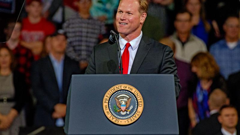 Congressman Steve Watkins speaks at a Donald Trump rally