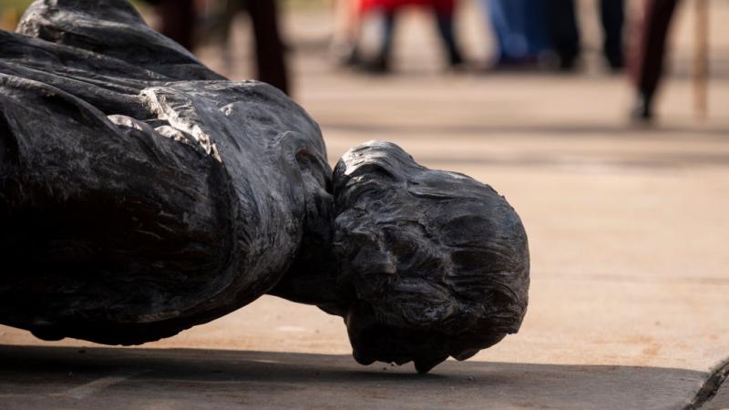 Toppled Christopher Columbus statue in Minnesota being loaded onto a truck on June 10, 2020