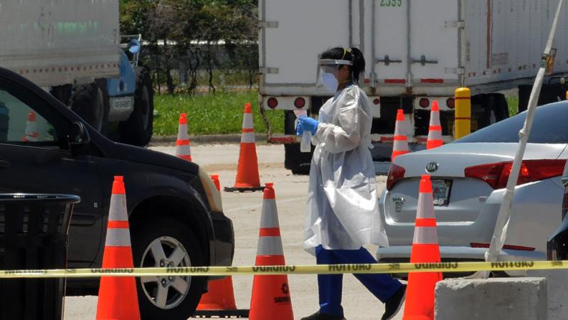 A healthcare worker at a Florida testing site