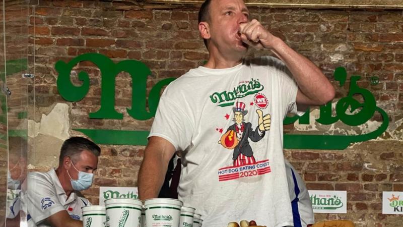 Joey Chestnut eats 75 dogs in 10 minutes at the annual Nathan's Hot Dog Eating contest.