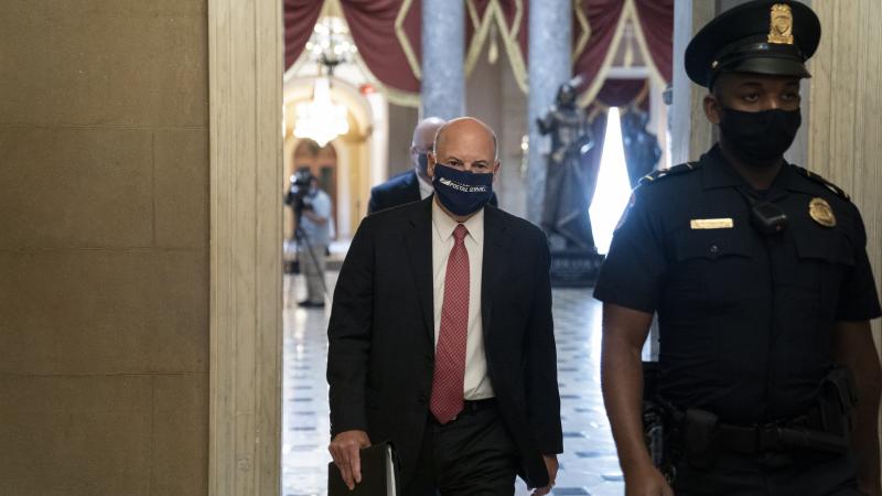 Postmaster General Louis DeJoy arrives for a meeting with Speaker of the House Nancy Pelosi.