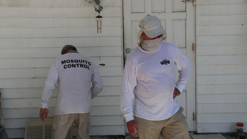 Mosquito control workers in Florida