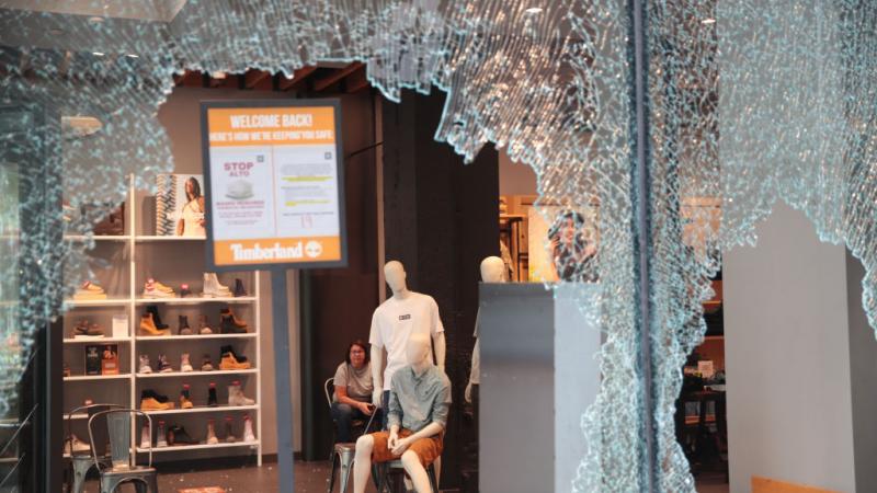 Shattered window on Michigan Avenue in Chicago following a night of looting