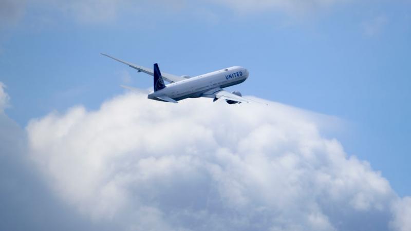 A United Airlines Boeing 777 at Brussels, July 29