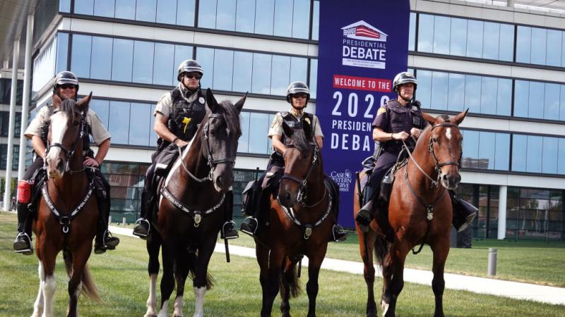 Police outside debate site