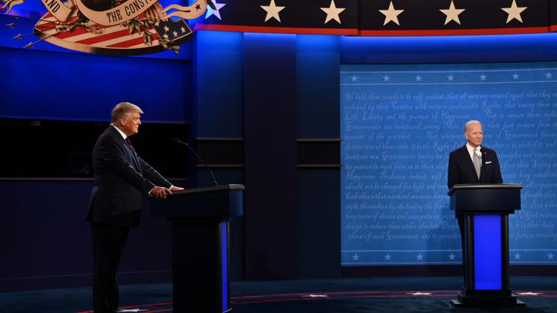 US President Donald Trump (L) and Democratic Presidential candidate and former US Vice President Joe Biden are seen during the first presidential debate at the Case Western Reserve University and Cleveland Clinic in Cleveland, Ohio on September 29, 2020. 
