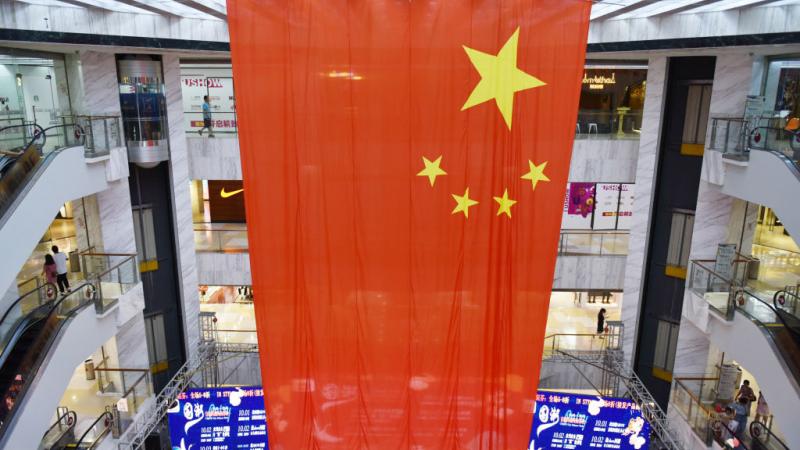 Chinese flag at Yi Xin Cheng shopping mall in October 2020