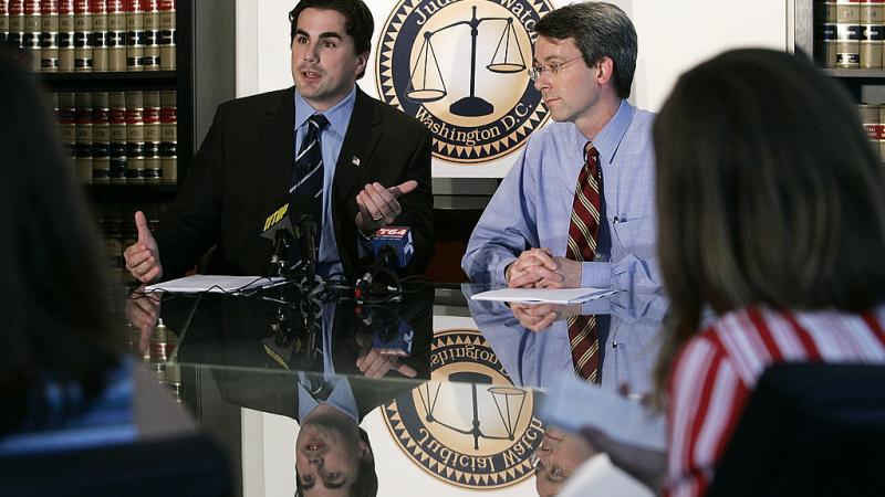 Judicial Watch founder Tom Fitton (L)