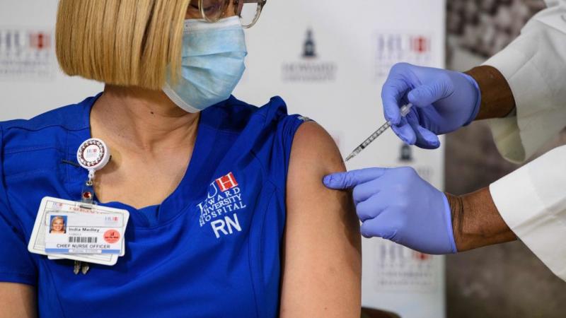 Administration of the COVID-19 vaccine, Washington, D.C. Dec. 15