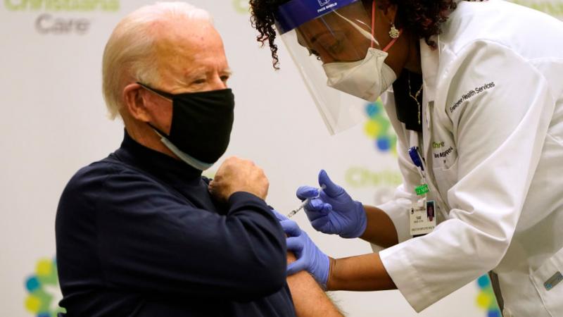 Joe Biden getting COVID-19 vaccine from nurse practitioner Tabe Masa on Dec. 21, 2020