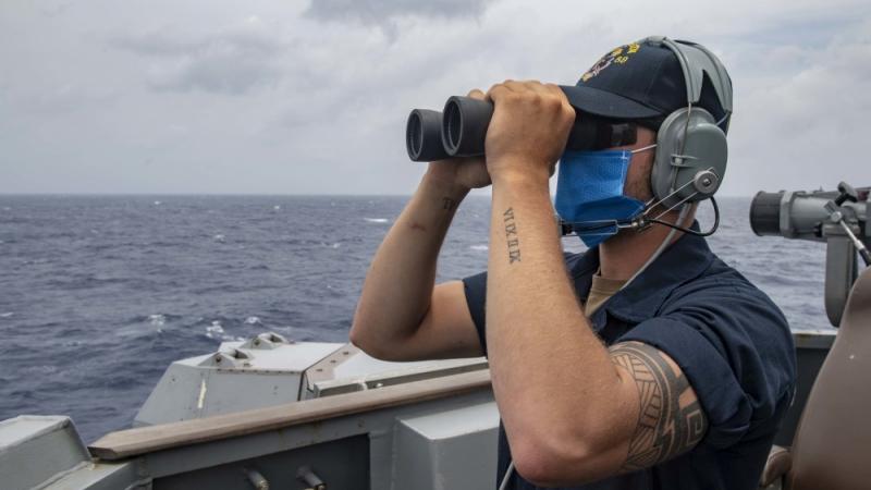 The USS Mustin transits the South China Sea