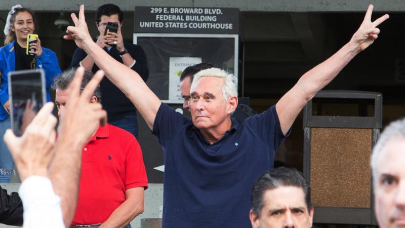 Roger Stone victory salute