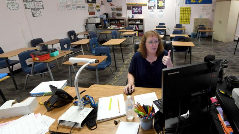 Clark County teacher talks remotely with her seventh grade class