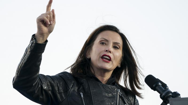 Gov. Gretchen Whitmer speaks during a drive-in campaign rally with Democratic presidential nominee Joe Biden and former President Barack Obama at Belle Isle on October 31, 2020 in Detroit, Michigan.