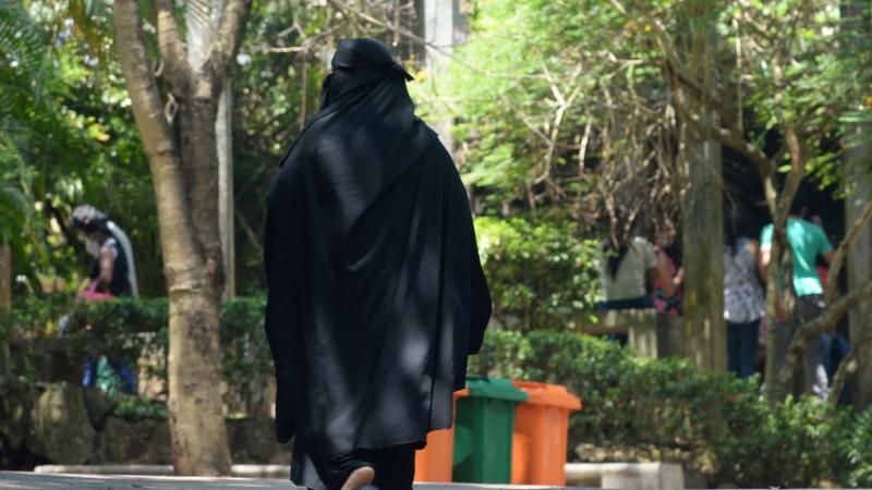 Muslim woman wearing a burqa at a zoological park on the outskirts of Colombo