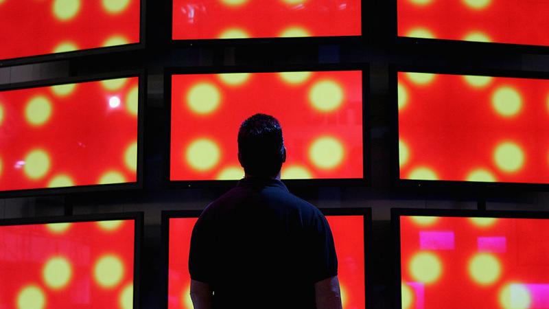 Man looks at Panasonic televisions in Nevada in 2005