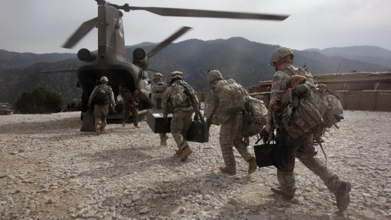 U.S. troops board Army Chinook in Afghanistan in 2008