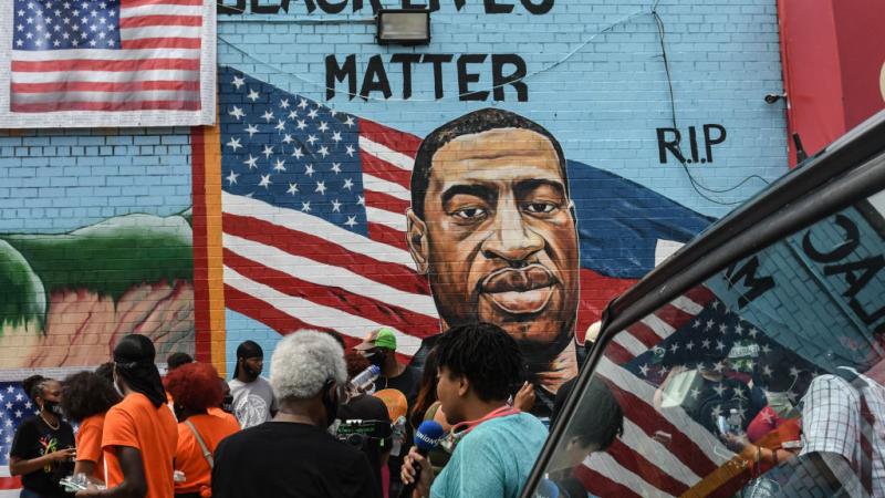 Mural depicting George Floyd painted by Kenny Altidor