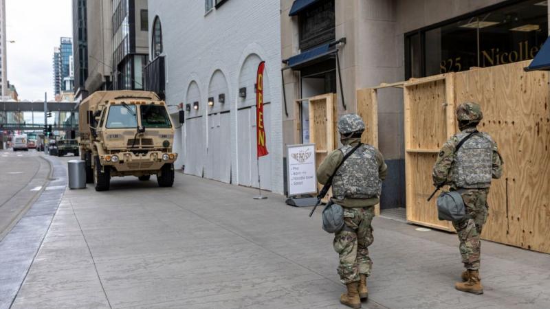 Members of National Guard patrol downtown Minneapolis, Minnesota on April 14, 2021