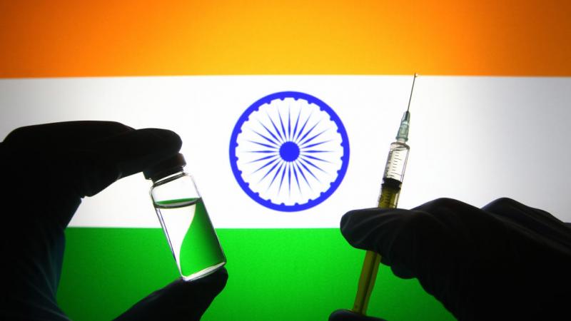 Indian flag with COVID-19 vaccine.