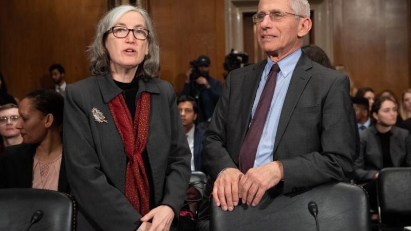 Dr. Anne Schuchat and Dr. Anthony Fauci.