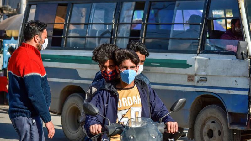 Cyclists in Kashmir, India, Apr. 19