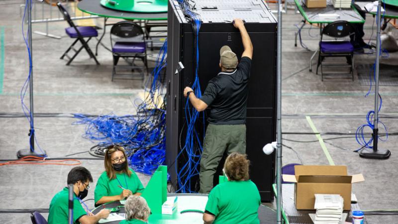 Workers during the Arizona audit, May 3