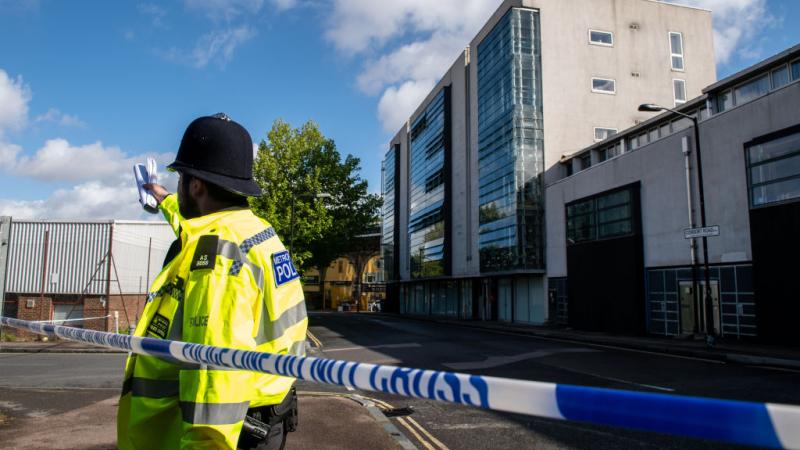 Police officer at the crime scene of the shooting of BLM activist Sasha Johnson.