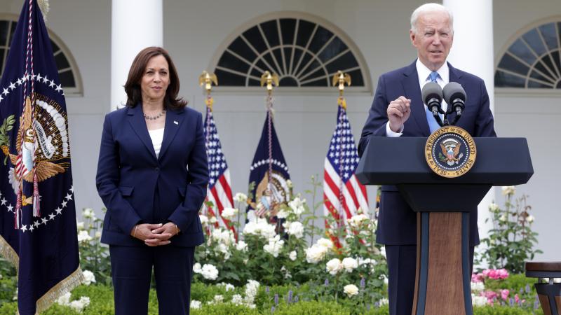 U.S. President Joe Biden delivers remarks on the COVID-19 response and vaccination program as Vice President Kamala Harris listens in the Rose Garden of the White House on May 13, 2021 in Washington, DC.
