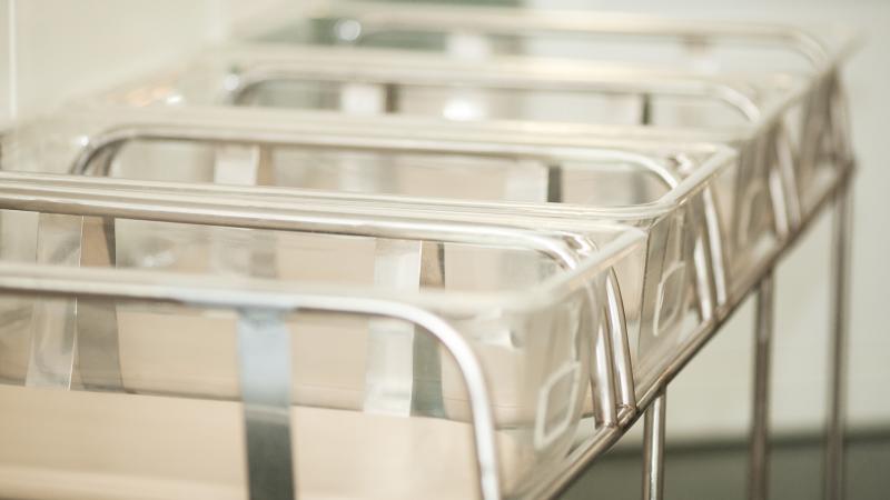 Empty cribs at a hospital