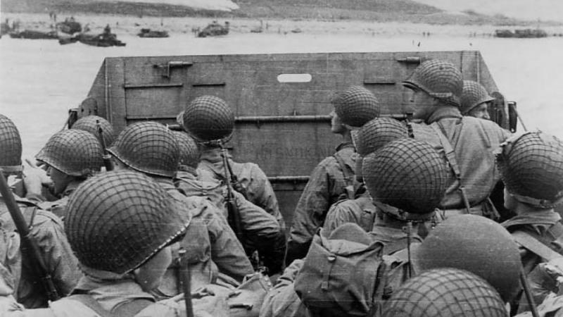 U.S. troops prepare to storm the beaches of Normandy on D-Day.