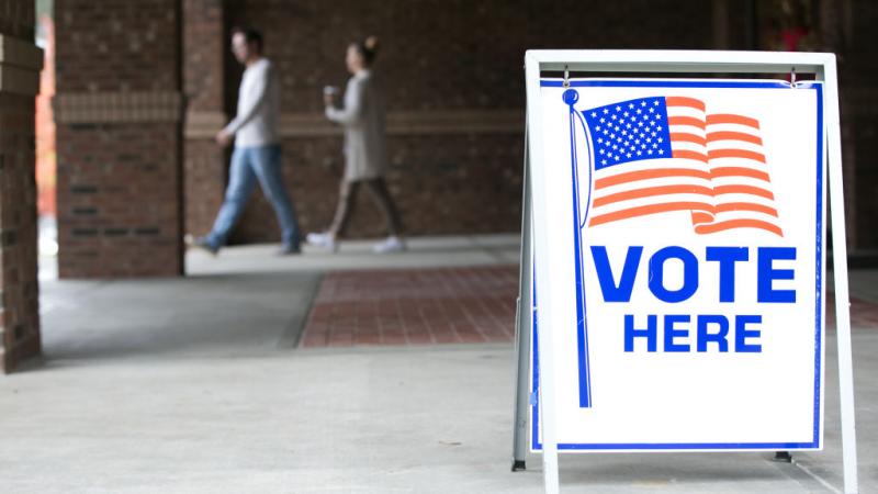 People leave polling station at Noonday Baptist Church in Georgia in November 2018