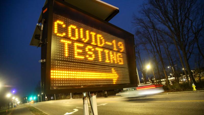 Sign directs people to coronavirus testing area