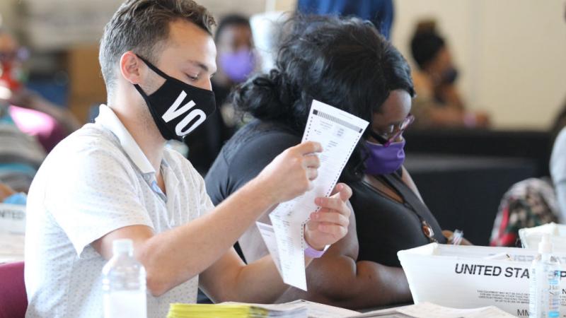 Ballot workers at State Farm Arena, Nov. 5, 2020