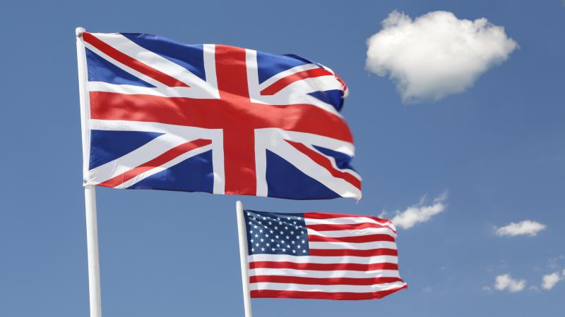 The United Kingdom and United States flags fly together.